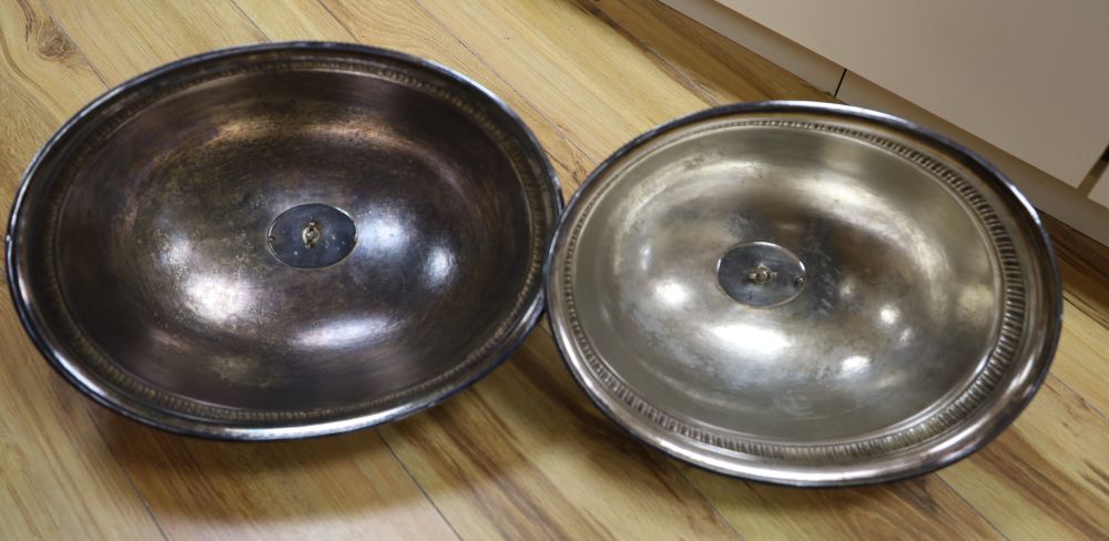 A pair of Victorian silver plated meat domes